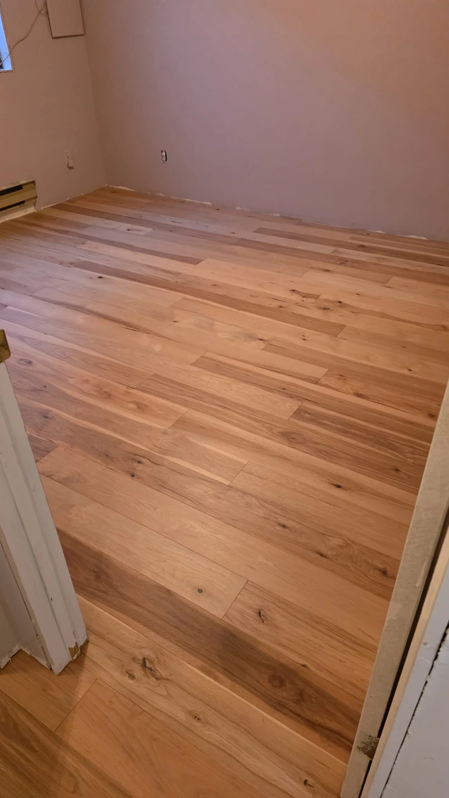 Engineered hardwood installation by MB Home Services